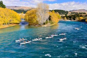 Kayakers paddling the Clutha River during the 2013 Wild Descent.